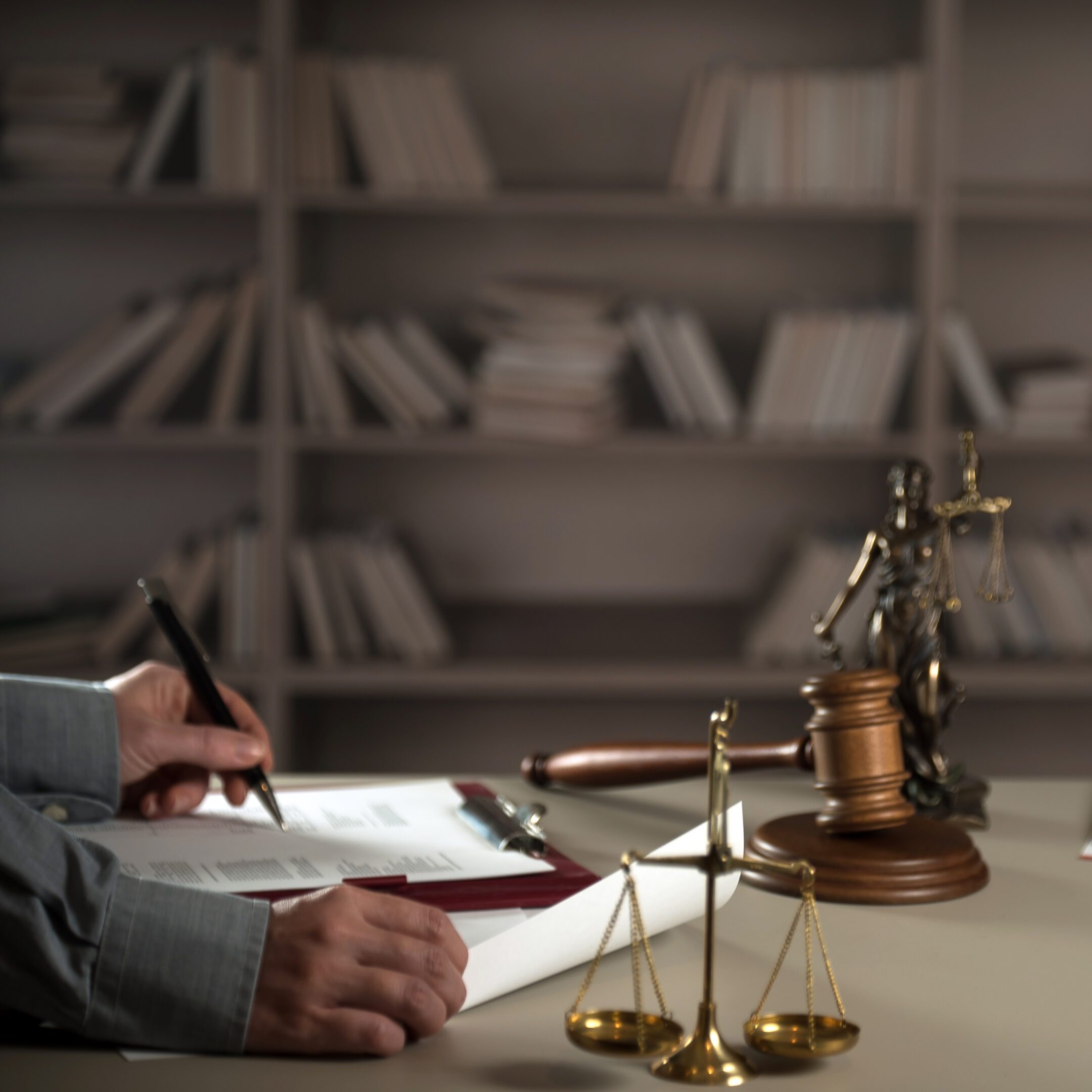 Person writing in law office