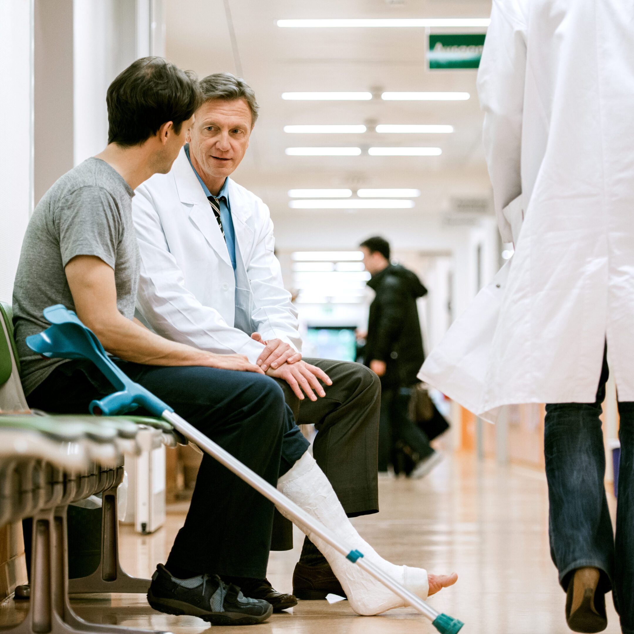 Injured man talking to medical professional