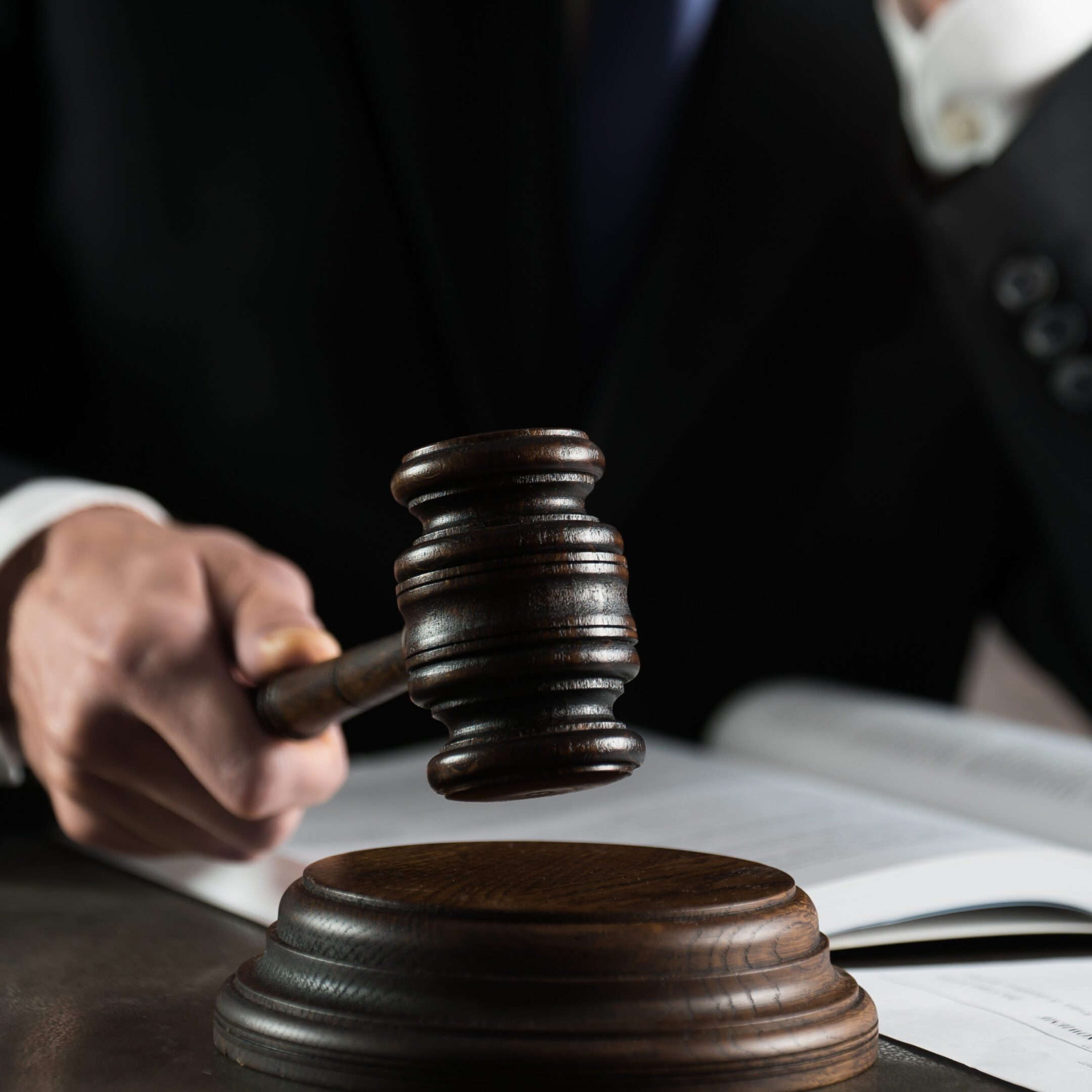 Wooden gavel in courtroom setting